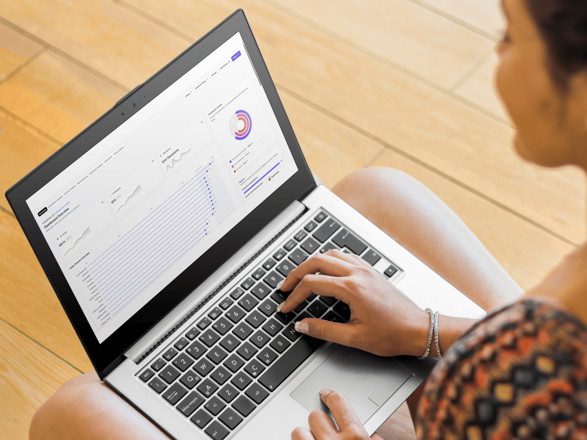 girl-using-pc-laptop-on-wooden-floor-mockup-generator-1